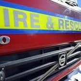 Fire crews and paramedics were called to reports of a car on its roof