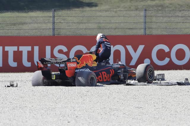 Max Verstappen in the gravel on the opening lap