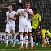Regan Poole celebrates his first goal for MK Dons