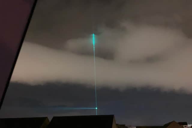 The laser shot up into the sky. Photo: Tom Marvin