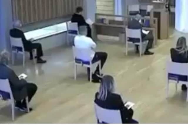 This is how the mourners had to sit - even though some of them were in the same support bubble