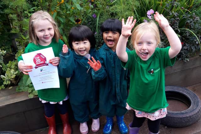 Children from Acorn's Kents Hill nursery celebrate their success