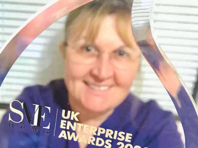 Dr Teresa Day with the award