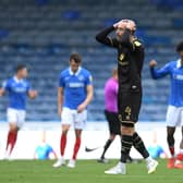 A frustrated Richard Keogh after Dons' defeat to Portsmouth