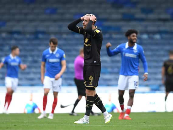 A frustrated Richard Keogh after Dons' defeat to Portsmouth