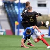 Baily Cargill gets tackled at Portsmouth