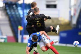 Baily Cargill gets tackled at Portsmouth