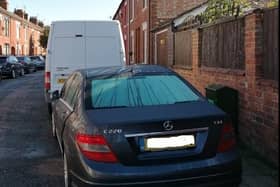 One of the new bins crammed up against a car on the narrow New Bradwell street