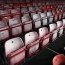 Hundreds of people in Milton Keynes have signed a petition calling for the Government to let football fans back into stadiums.
