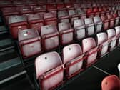 Hundreds of people in Milton Keynes have signed a petition calling for the Government to let football fans back into stadiums.