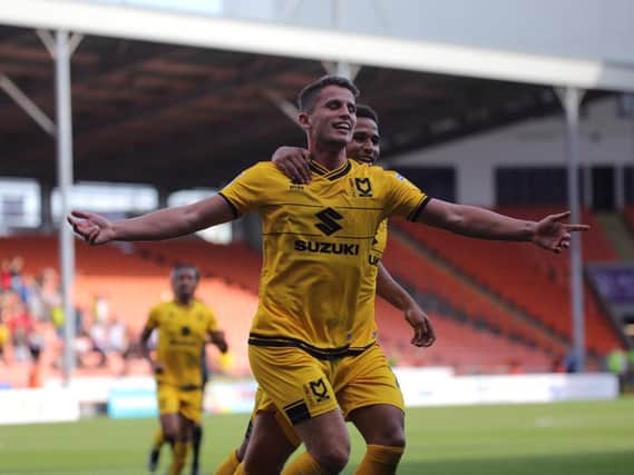 Jordan Houghton celebrates his goal against Blackpool