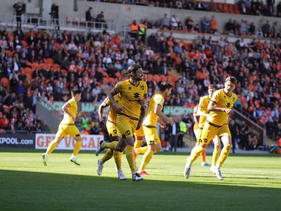 Russell Martin celebrates his goal at Blackpool last season.