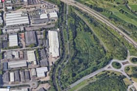 The triangular piece of land could house two warehouses