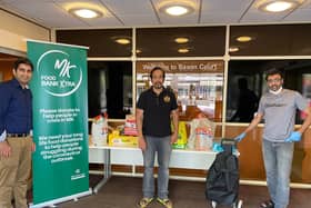 Members of AMYA donating to MK Food Bank