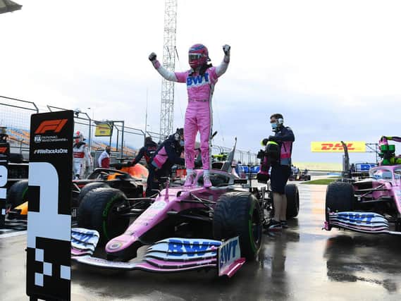 Lance Stroll celebrates his pole position