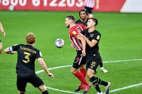 Warren O'Hora battles against Sunderland