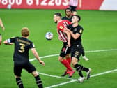 Warren O'Hora battles against Sunderland