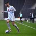 Ste Walker in action for Dons