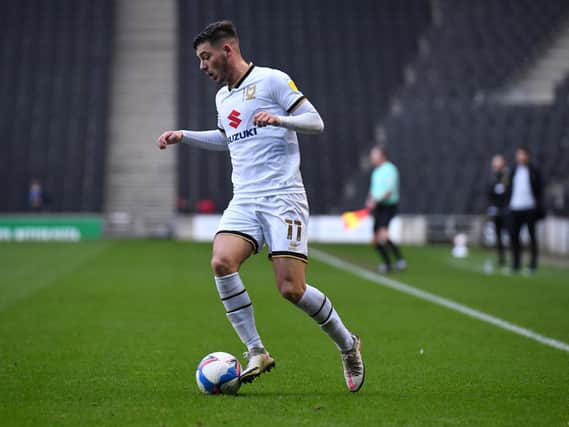 Ste Walker in action for Dons