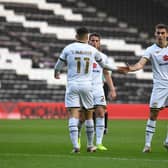 Dons celebrate Ste Walker's goal against Hull City