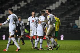 MK Dons celebrate Regan Poole's goal against Norwich