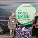 Helathcare staff donated 64 selection boxes to MK Foodbank
