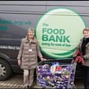 Helathcare staff donated 64 selection boxes to MK Foodbank