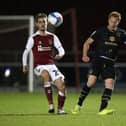 Dean Lewington in action against Northampton