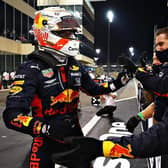 Max Verstappen celebrates with his team