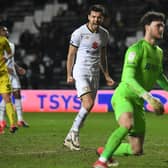 Scott Fraser celebrates scoring from the spot against Burton