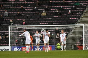 Richard Keogh protests after he feels he was fouled