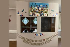 Local businesses team up to bring festive cheer to Milton Keynes care home with COVID-safe visiting booth