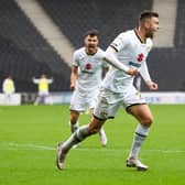 Daniel Harvie celebrates