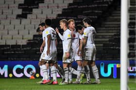 MK Dons celebrate Scott Fraser's goal against Bristol Rovers