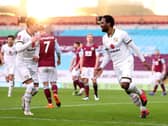 Cameron Jerome celebrates with Regan Poole at Burnley