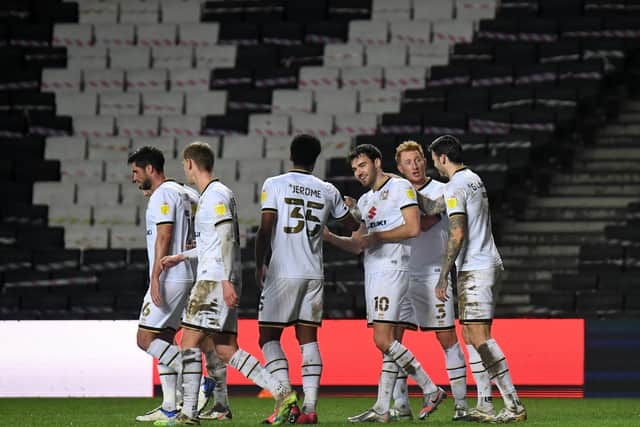 Dons celebrate against Bristol Rovers