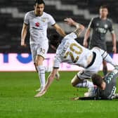 Joe Mason is upended by Paul Coutts