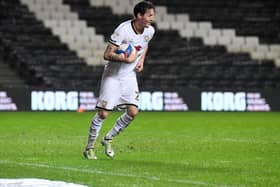 Joe Mason picks up his hat-trick ball