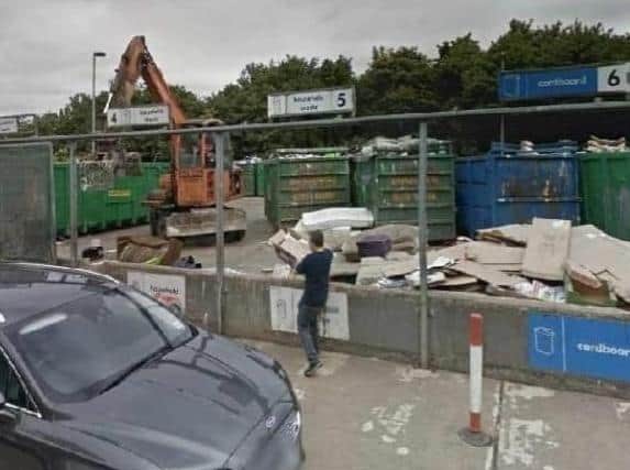 A household waste recycling centre in action