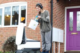 A Flipz driver preparing their 'consol-ation' package, available in Milton Keynes, ahead of the biggest gaming day of the year