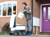 A Flipz driver preparing their 'consol-ation' package, available in Milton Keynes, ahead of the biggest gaming day of the year