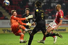 Andrew Fisher in action for MK Dons at Charlton earlier this season