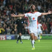 Will Grigg scored twice against Manchester United in the 4-0 win