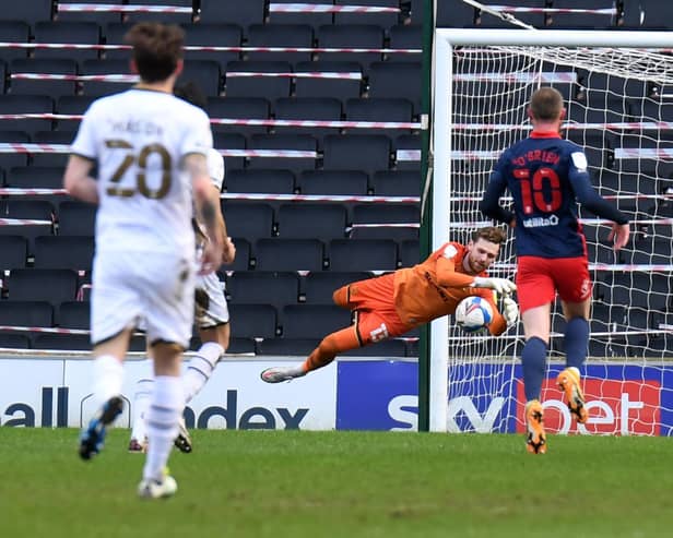 Andrew Fisher makes a save against Sunderland - one of many during the 2-2 draw
