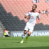 Will Grigg in action for MK Dons in 2014/15