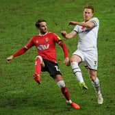 Dean Lewington in action against Charlton
