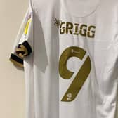 Will Grigg's new Dons shirt