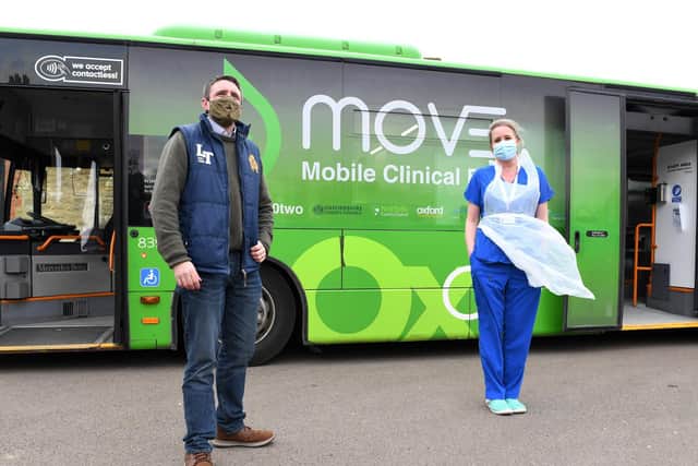 ECG CEO Jane Lambert and Milton Keynes MP Ben Everitt  showcasing the city bus that has been converted into a Covid testing and vaccination centre