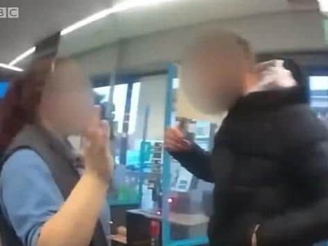 An aggressive customer threatens a Co-op worker. Photo: BBC
