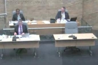 As the YouTube broadcast was switched off Cllr Marland, left, and mayor Andrew Geary (top centre) were continuing their 'discussion'
